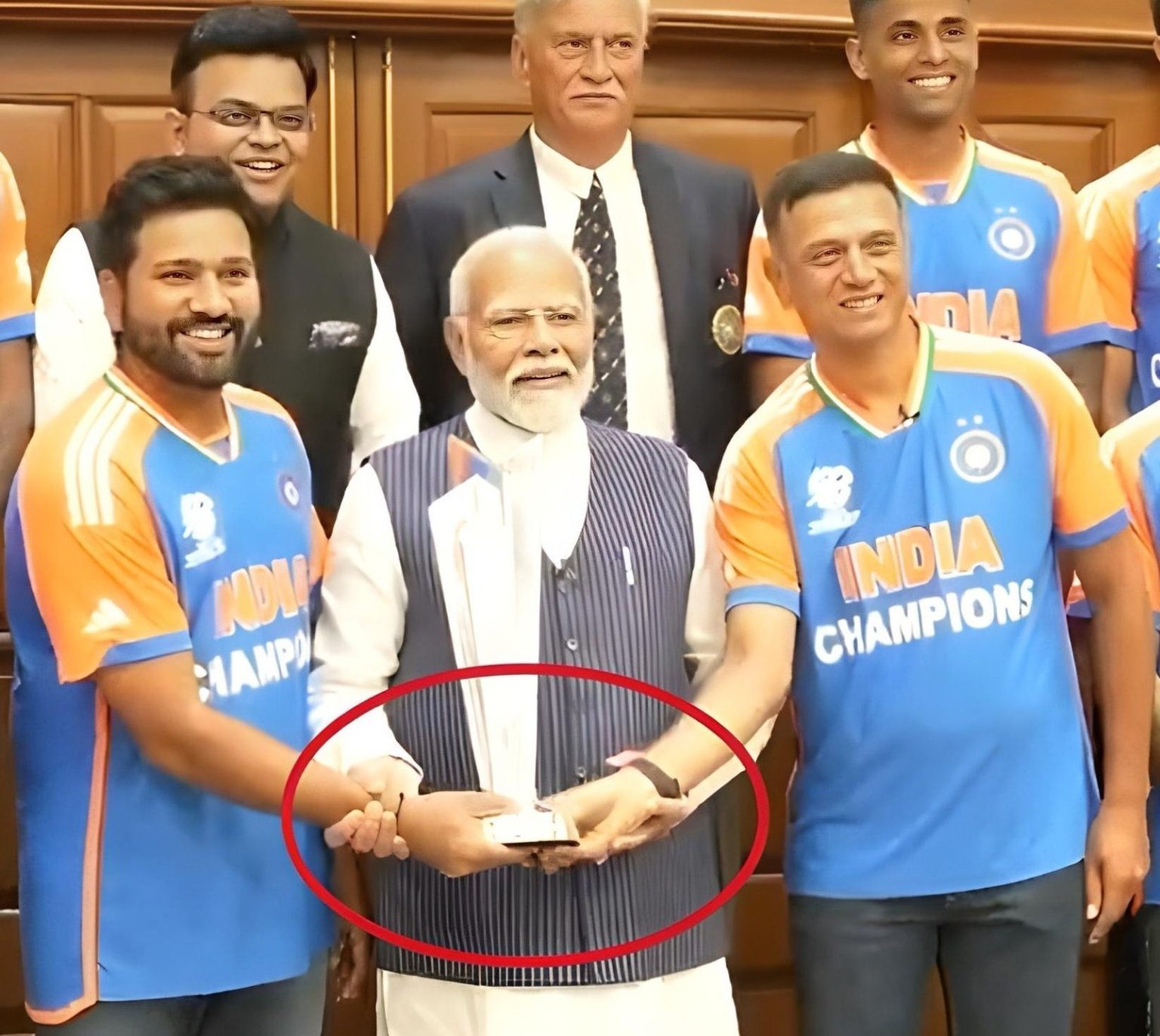 Why did PM Narendra Modi not touch the T20 World Cup 2024 trophy during the photo session?