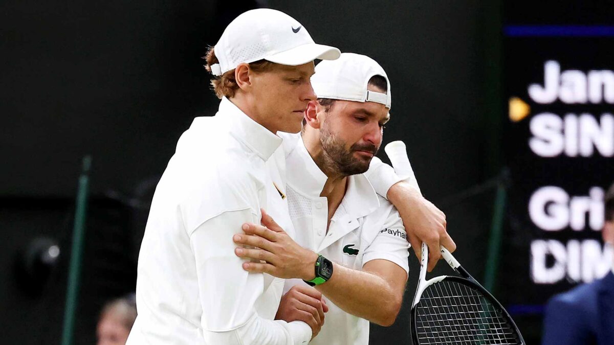 Jannik Sinner consoles Grigor Dimitrov after the Bulgarian's retirement from their match at Wimbledon on Monday