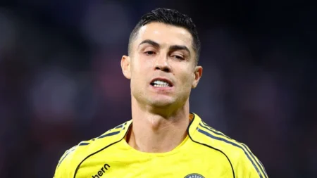 Cristiano Ronaldo earns a record salary at Al Nassr in the Saudi Pro League. His new two-year contract pays him INR 6,051.6 crore, plus bonuses for goals, assists, league titles, and a signing fee. He earns around INR 82.58 lakh daily, INR 3.44 lakh per hour, INR 57,333 per minute, and INR 955 per second.
