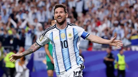 Lionel Messi celebrates after breaking World Cup goals record against Austria